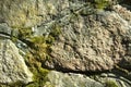 Old stonework covered with moss, stone wall Royalty Free Stock Photo