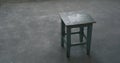 Old stool in empty room during renovation Royalty Free Stock Photo