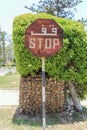 Old stop singe Arabic and English language. Royalty Free Stock Photo