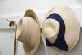 Old straw hats hanging on a wall in a mansion Royalty Free Stock Photo