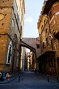 Old street with arched passage way, Florence