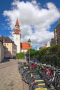 Old street with bicycle parking in the foreground Royalty Free Stock Photo