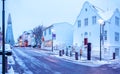 Old street in Central Reykjavik at twilight, Iceland. in the background church of Hallgrimur Royalty Free Stock Photo