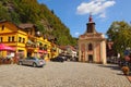 Old street with church in Hrensko village with amazing mountains behind. Famous touristic place and travel destination in Europe