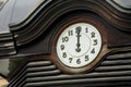 Old street clock, metal ornaments. The afternoon.