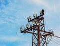 Old street concrete pillar with rusty iron part at top and cut wires. Installation or dismantling of electricity. Broken energy Royalty Free Stock Photo