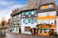 Old street decorated for Christmas in historic center of Colmar, France Royalty Free Stock Photo