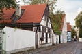 Old street with half-timbered houses in historical part of Klaipeda.