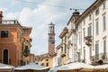 Old street with historic houses in Verona, Italy