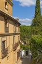 The old street with House of the Moorish King. Exterior historic architecture of 18th century. Ronda, Andalusia, Spain Royalty Free Stock Photo