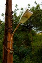 Old street lamp on an electricity pole Royalty Free Stock Photo