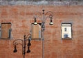 Old street lamp in front of brick wall, Roma Royalty Free Stock Photo