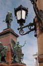 old street lamp in front of statue of Emperor Alexander II, Helsinki, Finland Royalty Free Stock Photo