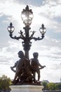 Old Street lamp (girandole) with bronze figures of babies. Paris