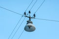 Old street lamp hanging on wires Royalty Free Stock Photo