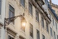 Old street lamp in Lisbon, detail of an old lighting in the cit Royalty Free Stock Photo