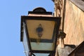 Old street lamp with new bulb in the vicinity of the St. Martin`s Church in French town Colmar. Royalty Free Stock Photo