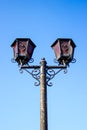 Old street lamp. Vintage street lamp on sky background. Lantern and hearts