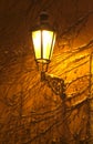 Old street lamp on a wall Royalty Free Stock Photo