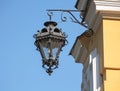 Old street lamp on the wall of the temple Royalty Free Stock Photo