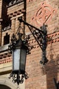 Old street lantern on the brick wall ,Chernivtsi University,Ukraine Royalty Free Stock Photo