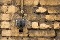 Old street light switch on a yellow brick wall Royalty Free Stock Photo