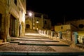 old street of the medieval city of Burgos, illuminated at night and next to the cathedral. Spain Royalty Free Stock Photo