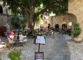 Old street  with restaurant in Rhodes town Royalty Free Stock Photo