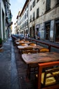 Old street with side street restaurant, Florence Royalty Free Stock Photo