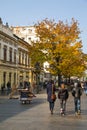 The old street Skadarlija in Belgrade, Serbia, people, yellow autumn trees