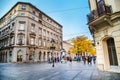 The old street Skadarlija in Belgrade, Serbia, people, yellow autumn trees