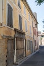 Old street small alley L`Isle-sur-la-Sorgue France in Provence Royalty Free Stock Photo