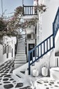 Old street with whitewashed houses in Mykonos