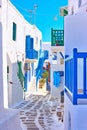 Old street with whitewashed houses in Mykonos