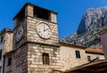 Old streets and ancient buildings and objects of the old city in Kotor .The clock on the tower.September 25, 2018 Royalty Free Stock Photo