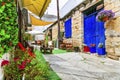 Charming streets with cute cafe bars in old traditional villages of Cyprus island Royalty Free Stock Photo