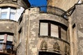 spalling decorative stucco finish on old stucco finished residential building elevation in Budapest Royalty Free Stock Photo