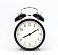 Old-style alarm clock, black and white. Isolaed on white. Royalty Free Stock Photo