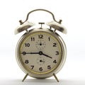 Old style alarm clock, metal, it`s quarter to four. Royalty Free Stock Photo