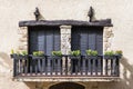 Old-style balcony with French shutters Royalty Free Stock Photo