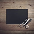 Old style barber tools and black page Royalty Free Stock Photo