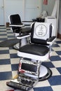 The vintage barber shop with the black and white barber chairs.