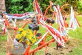 Old style classic bicycle with red and white ribbon on it and flower on the basket Royalty Free Stock Photo