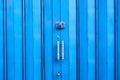 Old style of closed blue steel door. Royalty Free Stock Photo