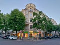 Old style corner apartment building with commercial stores on the basement Royalty Free Stock Photo