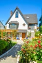 Old style family house with landscaped front yard and pathway to the entrance Royalty Free Stock Photo