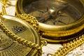 Old style gold compass & calendar Royalty Free Stock Photo