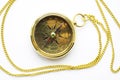 Old style gold compass with chain Royalty Free Stock Photo