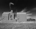 Old style grain elevator in black and white Royalty Free Stock Photo