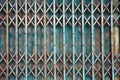 Old style grunge metal blue door with rusty. Royalty Free Stock Photo